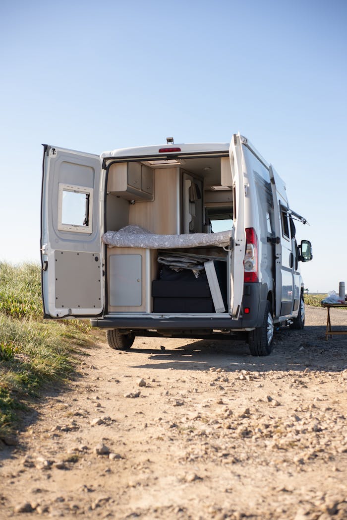 Explore the open road with this spacious camper van in scenic Portugal. Ideal for summer adventures.